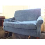 A modern Multiyork blue upholstered two seater sofa