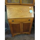 A light oak bureau with single drawer,