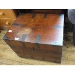 A mahogany and metal bound chest with iron handles and internal candlebox and key