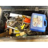 A black painted pine workbox with various tools including clamps,