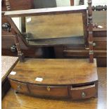 A mahogany swing toilet mirror with three drawers to base