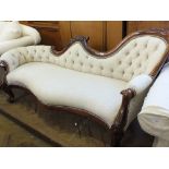 An elegant mahogany framed cream upholstered button back chaise longue style salon settee