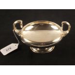 A two handled bowl marked Sterling with inscription