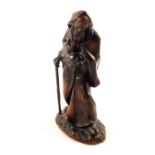 A German carved wooden figure of St Francis of Assisi