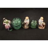 Two Stourbridge dump weights plus three continental porcelain figures