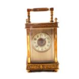 A brass carriage clock with escapement movement, enamel dia marked Payne & Co Tunbridge Wells,