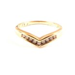 A 9ct Gold diamond set wishbone ring,