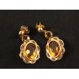 A pair of 14ct gold earrings,