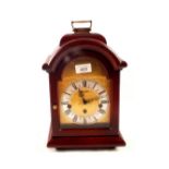 A Hermle-German mahogany cased striking mantel clock