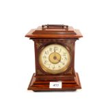 A mahogany cased mantel clock