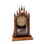 An Edwardian mahogany striking mantel clock of architectural form