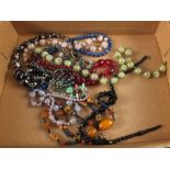 A quantity of good quality vintage beads including glass examples