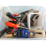 A box of various woodworking tools