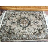 Three floral wool rugs