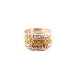 A 9ct gold diamond triple row ring,