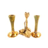 A pair of Victorian Arts and Crafts brass and green ceramic candlesticks plus a Victorian swan