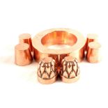 Six Victorian circular miniature copper jelly moulds viz: a pair of turret form and a plain set of