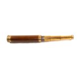 A brass four draw telescope by W & P Doughty,