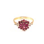 A 9ct gold ruby and diamond cluster ring,