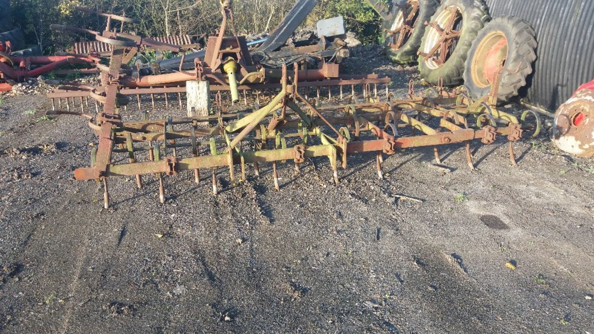 One Kongskilde spring tine harrow. Stored near Denham.