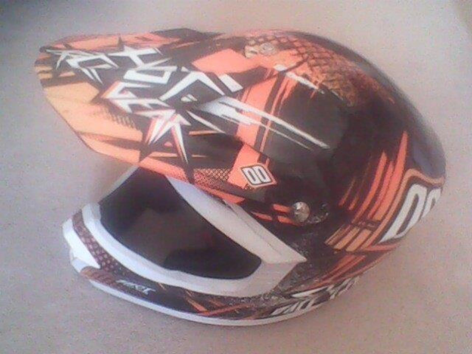 Motorcycle crash helmet, motor cross type, purchased from Bowers, new. Stored near Beccles.