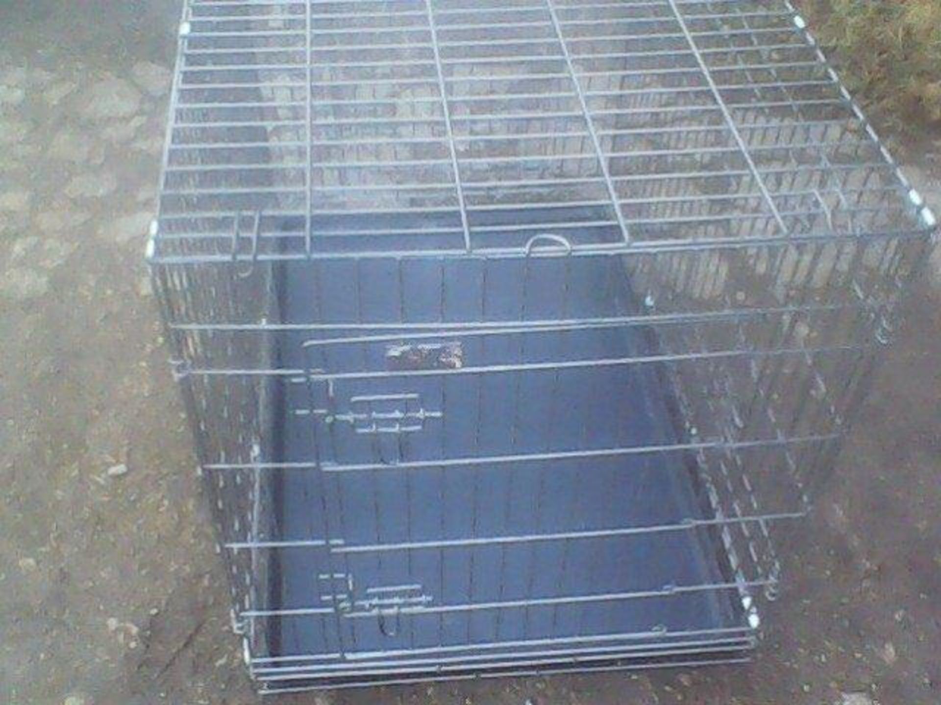 Large dog cage, used to catch feral cat, brand new February 2017. Stored near Beccles.