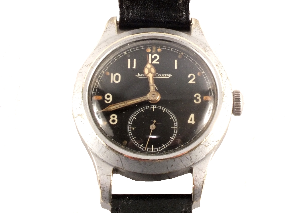 A Jaeger Le Coultre military gentleman's wristwatch with black dial (maker marked with broad arrow),