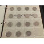 A coin album containing GB florins, half crowns, Victoria to Elizabeth,