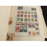 A stamp album and contents