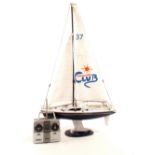 A radio controlled Yacht, 'University Club' fitted control gear,