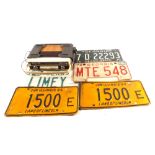 Four American car license plates,