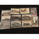 Twenty two postcards, early transport including trams, motorcycles,