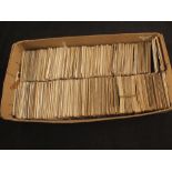 A box of various cigarette cards