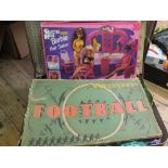 Various Barbie dolls and accessories plus a table football game