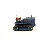 A Dinky 563 Blaw Knox heavy tractor in blue with light blue hubs and brown driver