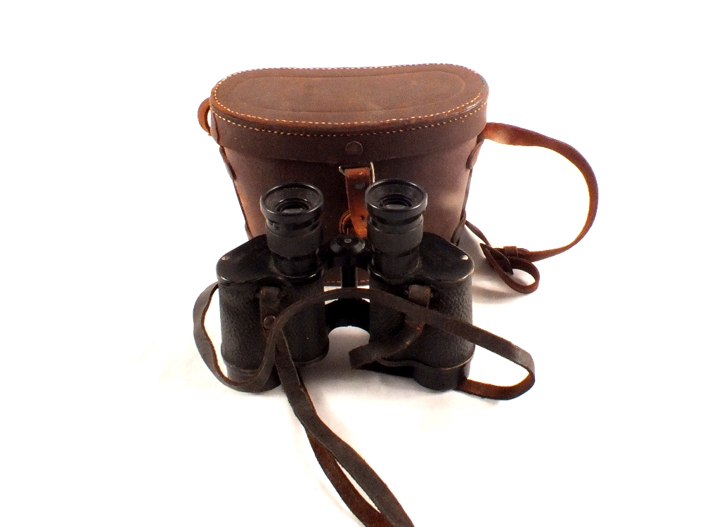 A pair of '1940 dated' military binoculars with case