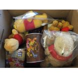 Two boxes of Winnie the Pooh bears plus other items