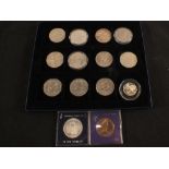 A case of coins and medallions to include 1889, 1951, 1953 crowns,