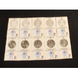 Ten US Olympic silver dollars