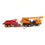 A Dinky 980 Coles crane truck and 959 Foden dump truck with yellow hubs