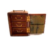 A Victorian gilt tooled leather three drawer travelling safe