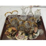 Cut glass decanters, claret jug,