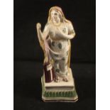 An early 19th Century square based figure,