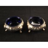 A pair of silver salts,