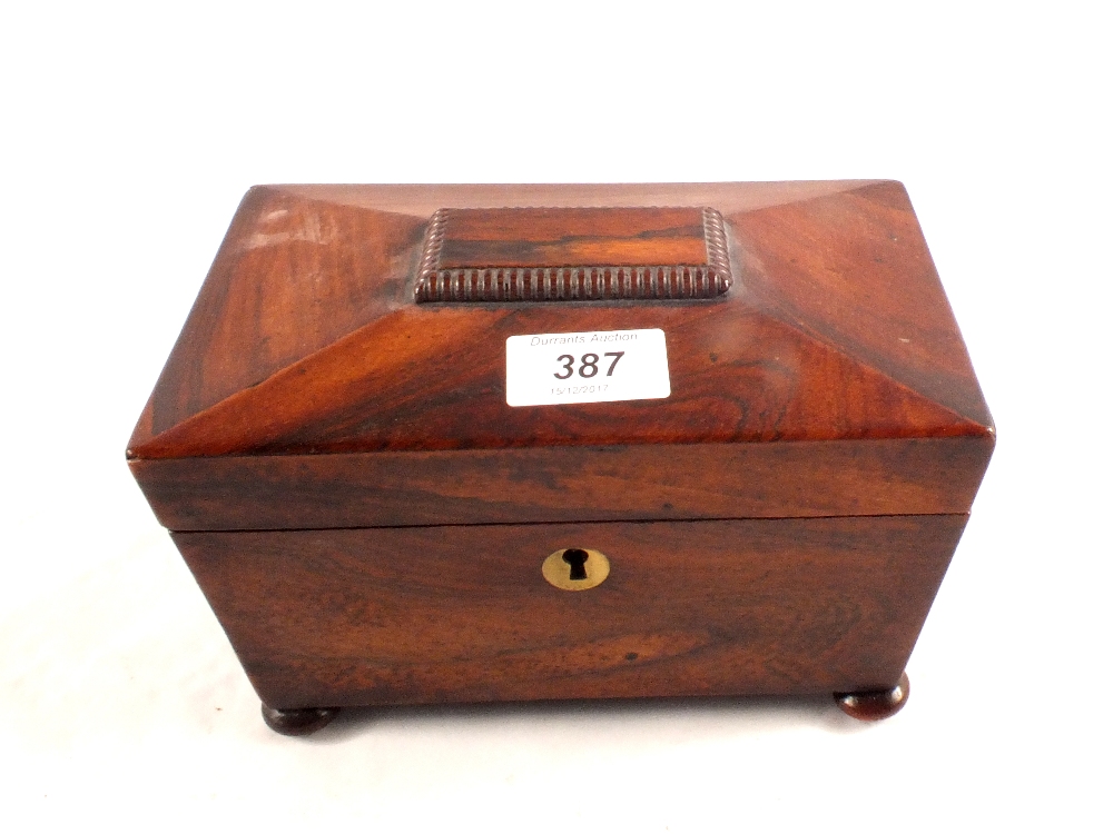 A 19th Century mahogany and rosewood two compartment sarcophagus tea caddy