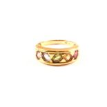 A continental 18ct gold ring set with five different coloured stones,