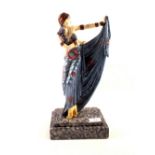 A decorative dancing lady figure