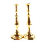 A large pair of Victorian beehive brass candlesticks on octagonal bases,