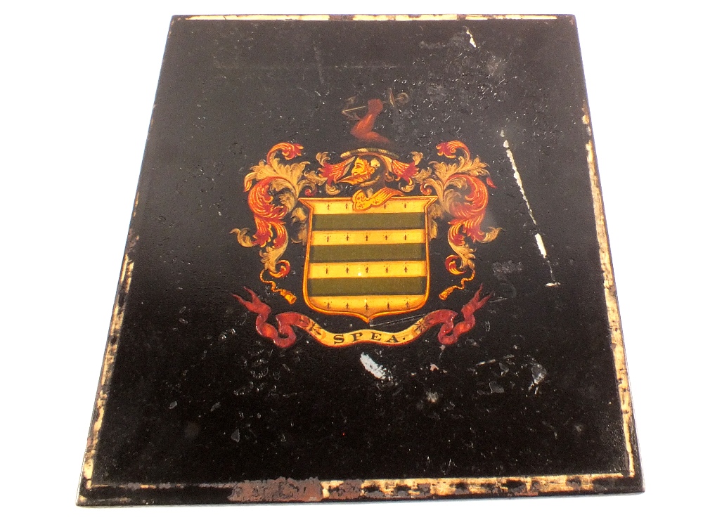 A black ground armorial panel,