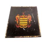 A black ground armorial panel,